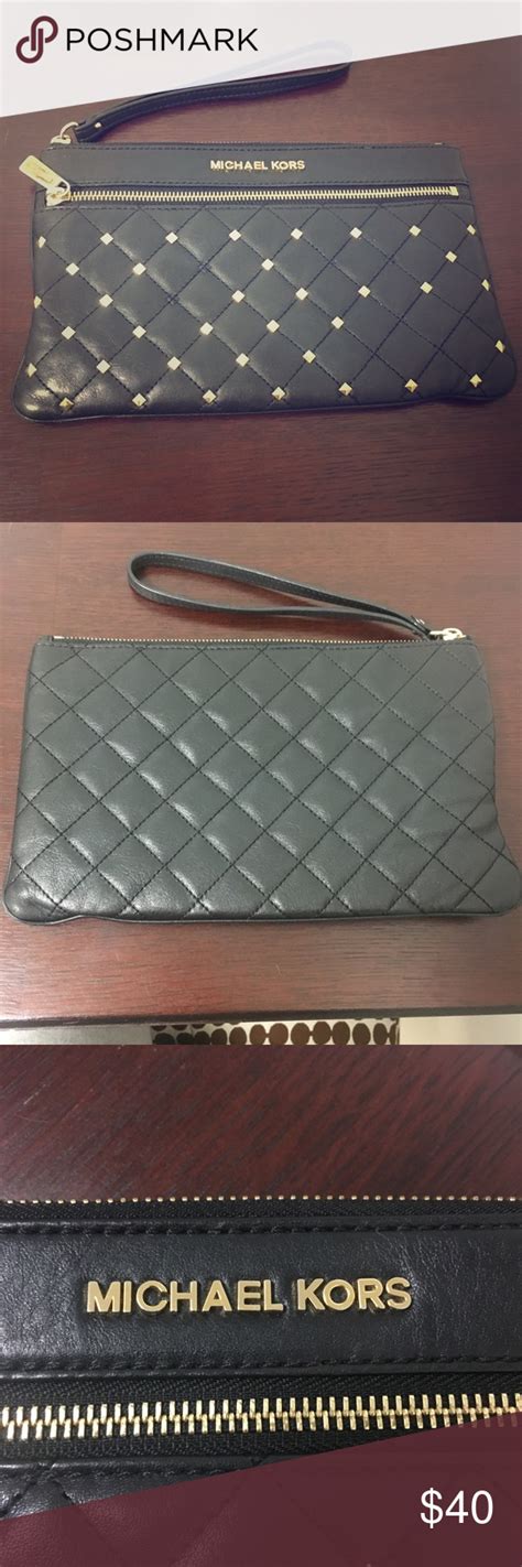 michael kors large wristlet nickel|Michael Kors studded wristlet.